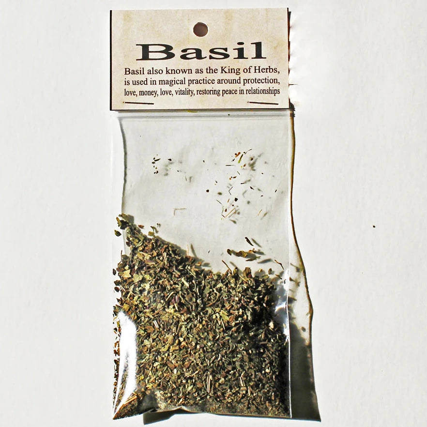 Packaged basil herb with a label on a white background