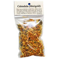 Bag of dried calendula flowers with a label on a white background