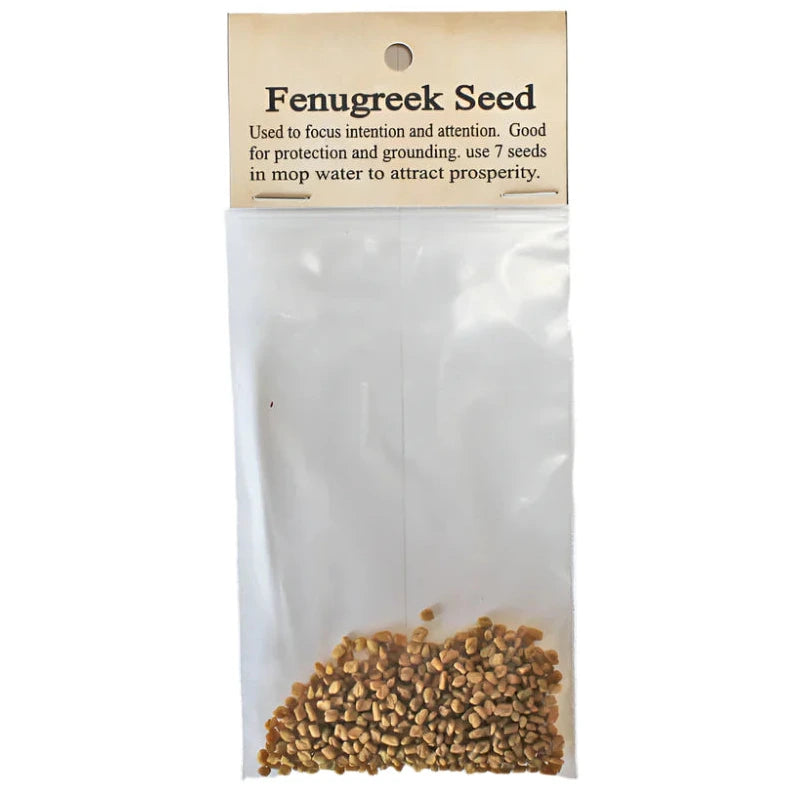 Bag of fenugreek seeds with a label on a white background