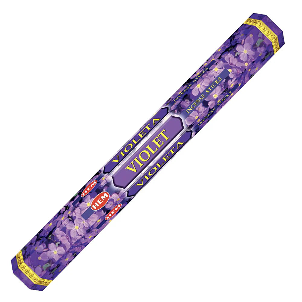 Pack of Violet incense sticks with floral design on a white background