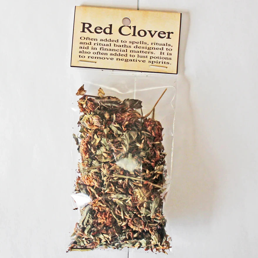 Bag of dried red clover with a label on a white background
